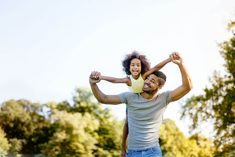 Happy family in open space