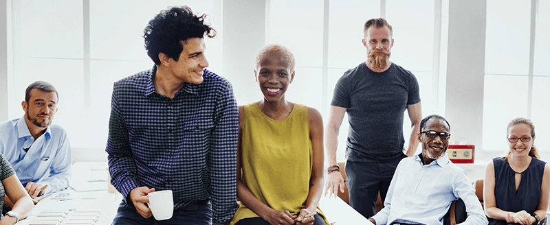 Professional team members in conference room