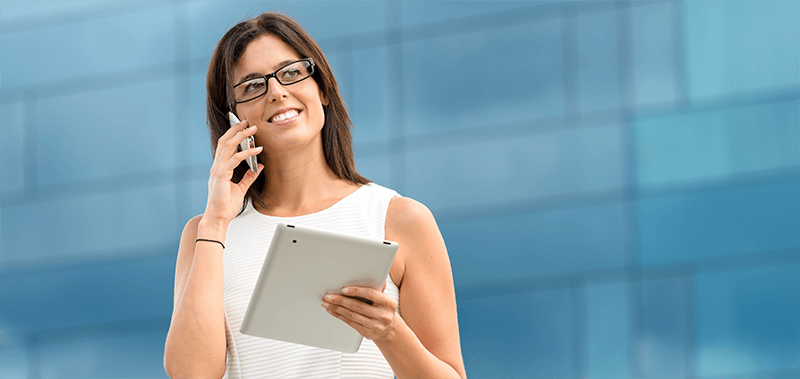 Professional woman conducting business over the phone