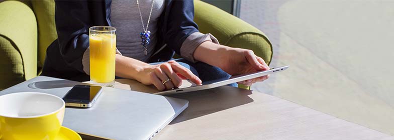 Woman looking at her tablet