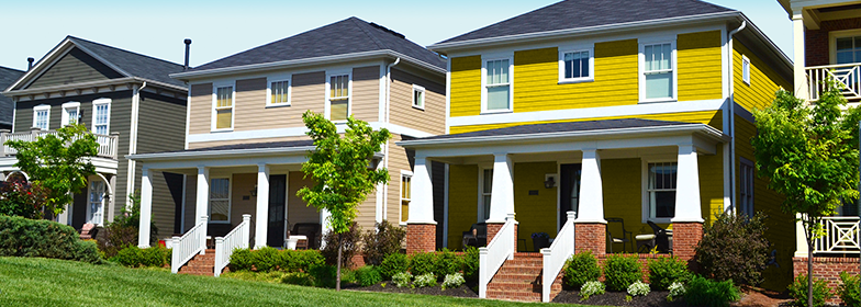 An image of three houses side by side.