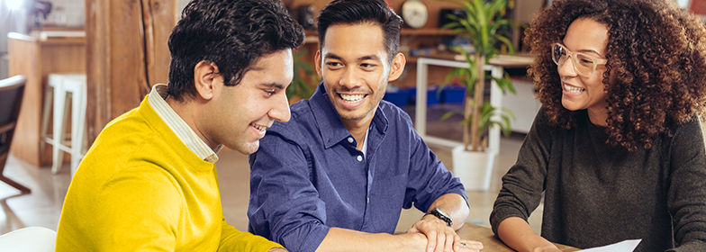 A couple meeting with a loan officer