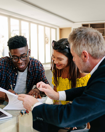 Young couple working with Loan Officer