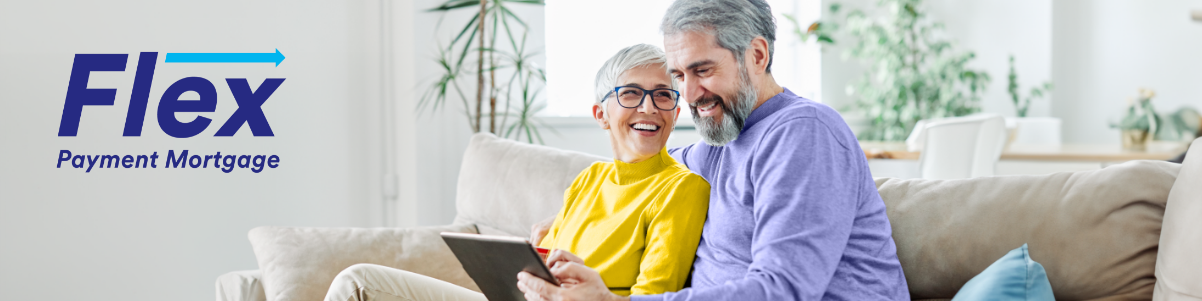 Smiling senior couple on couch with inset Flex Payment Mortgage logo